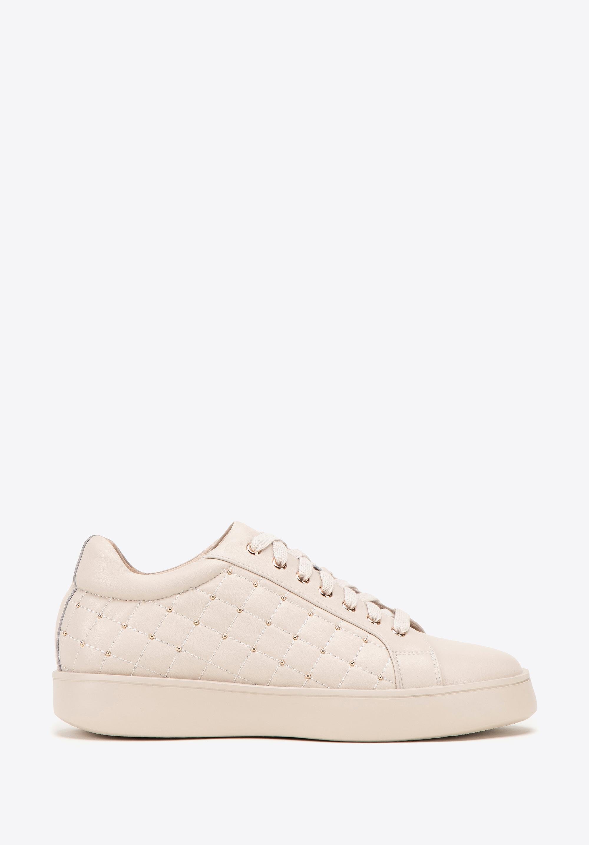 Damskie sneakersy skórzane z pikowaną cholewką kremowe
