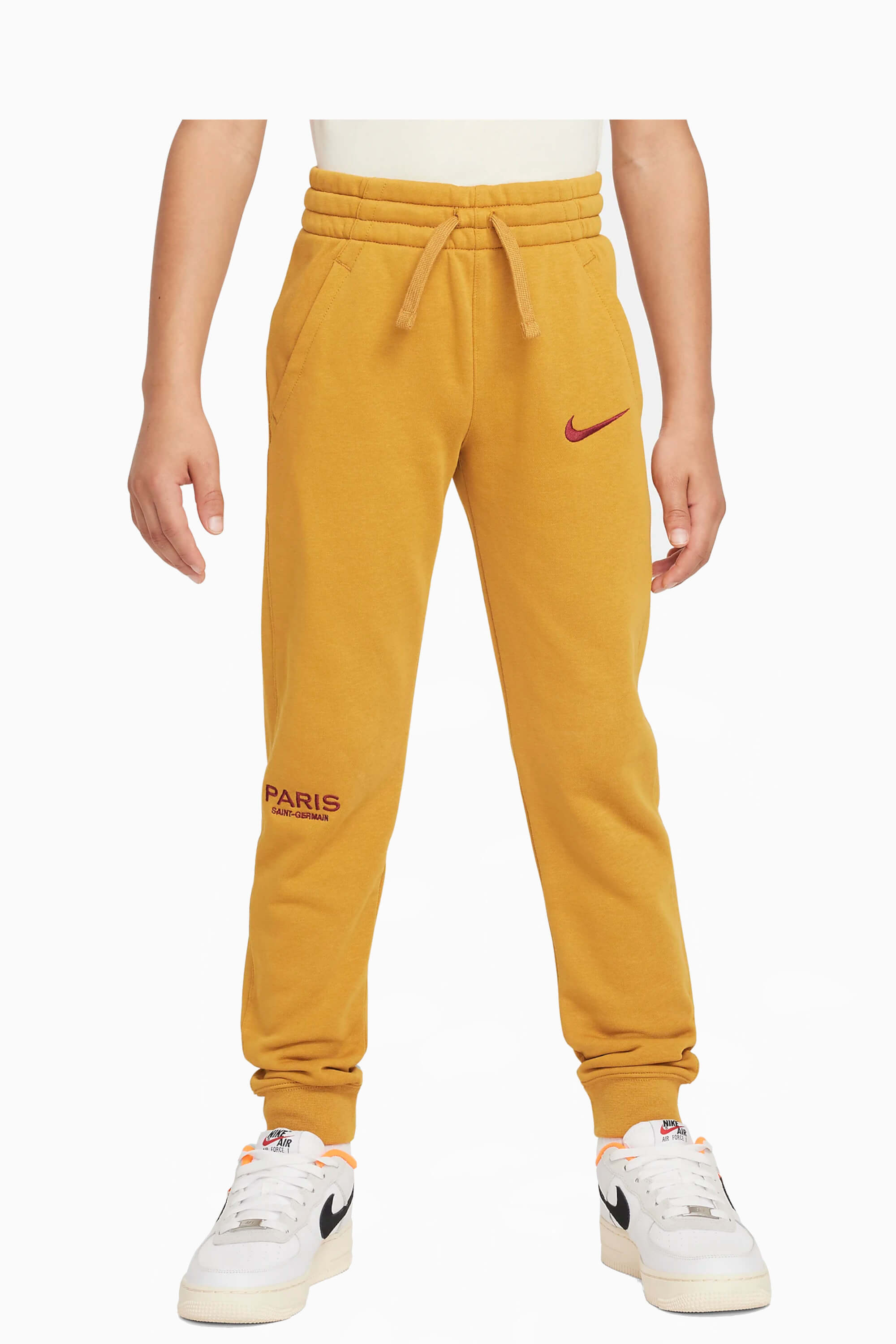 Spodnie Nike PSG 23/24 Club Junior - Pomarańczowy