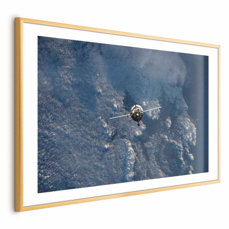 Plakat Artgeist Błękitna planeta 90x60 cm z ramą złotą 1 szt