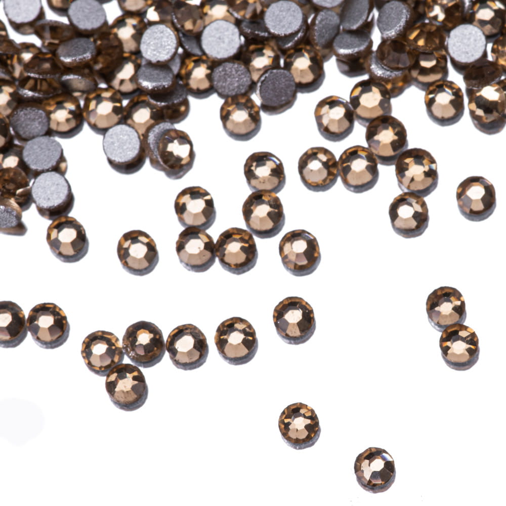 Cyrkonie do paznokci szklane ss3 light topaz ok.1440 szt paczka