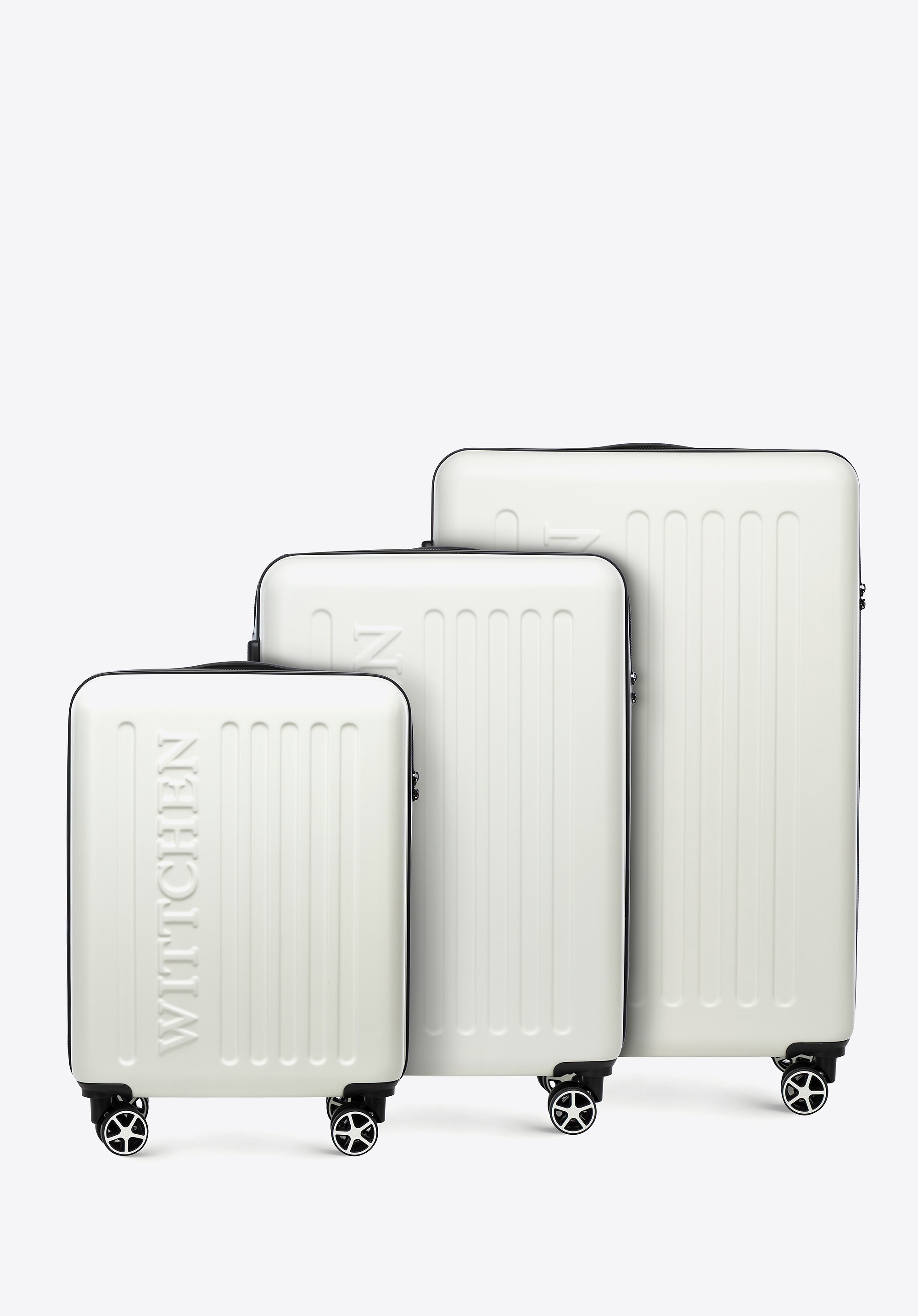 Zestaw walizek z ABS-u z tłoczonym logo biały