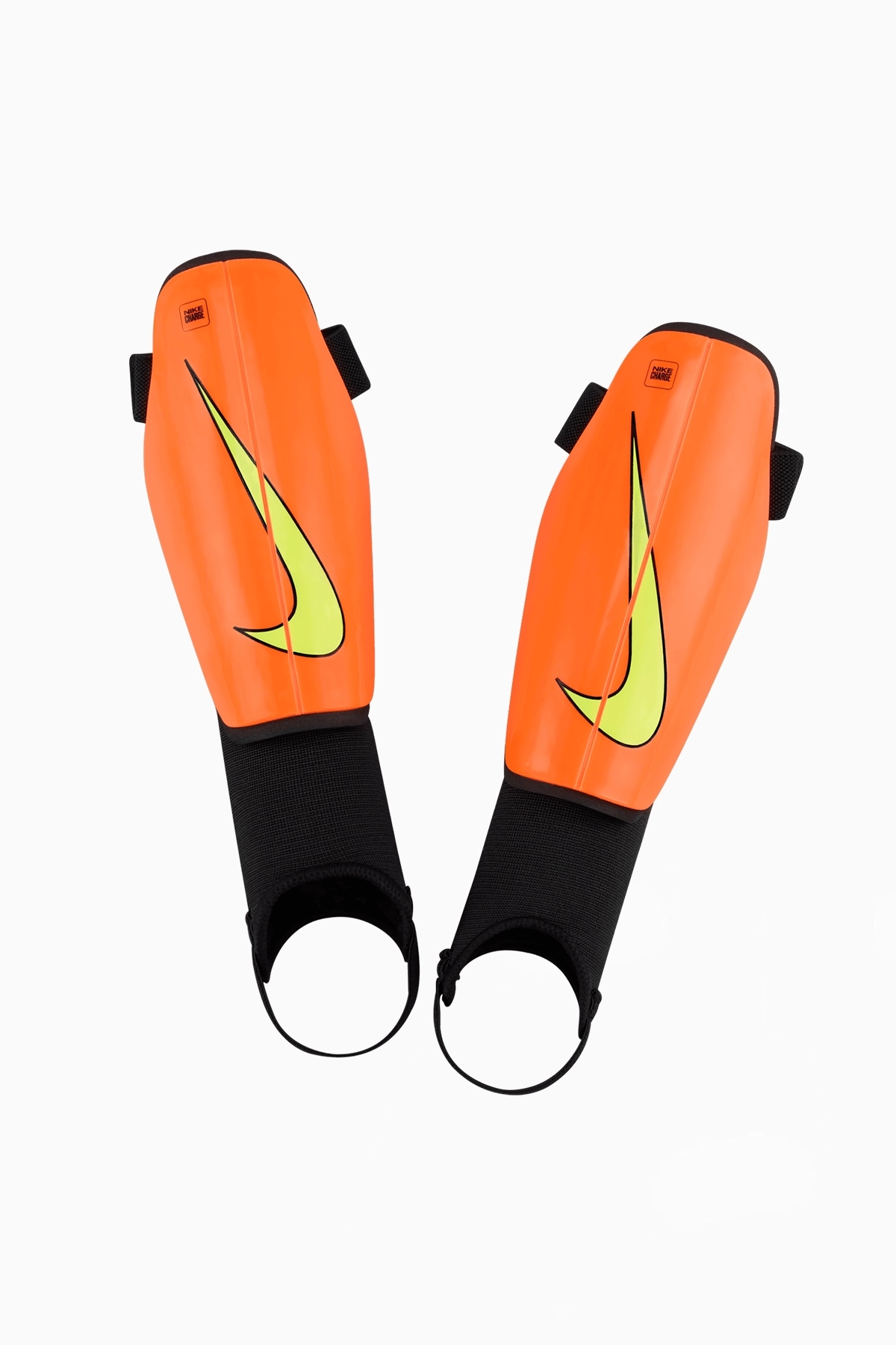 Ochraniacze Nike Charge Junior - Pomarańczowy