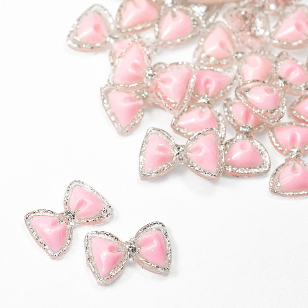 Ozdoby do paznokci kokardki 3D różowo srebrne 20 szt
