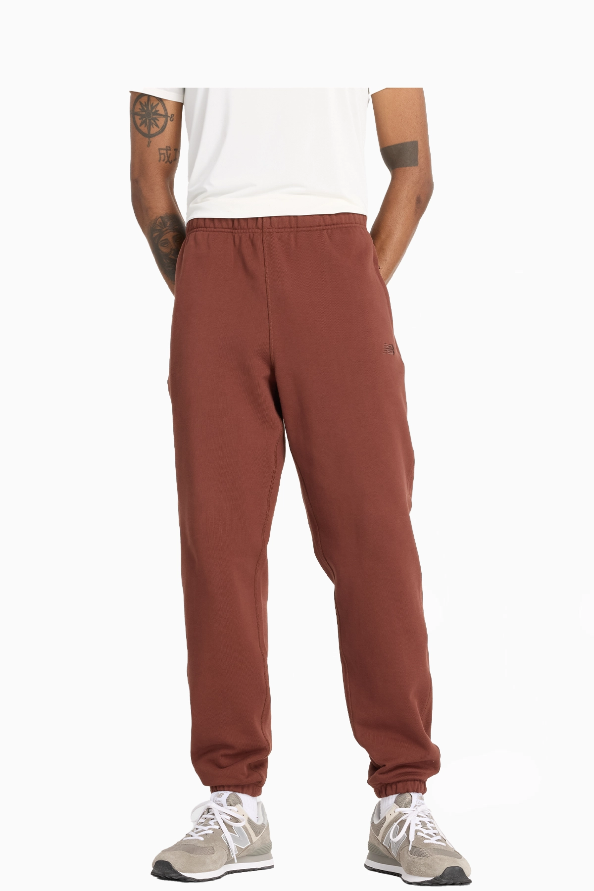 Spodnie New Balance Athletics - Brązowy