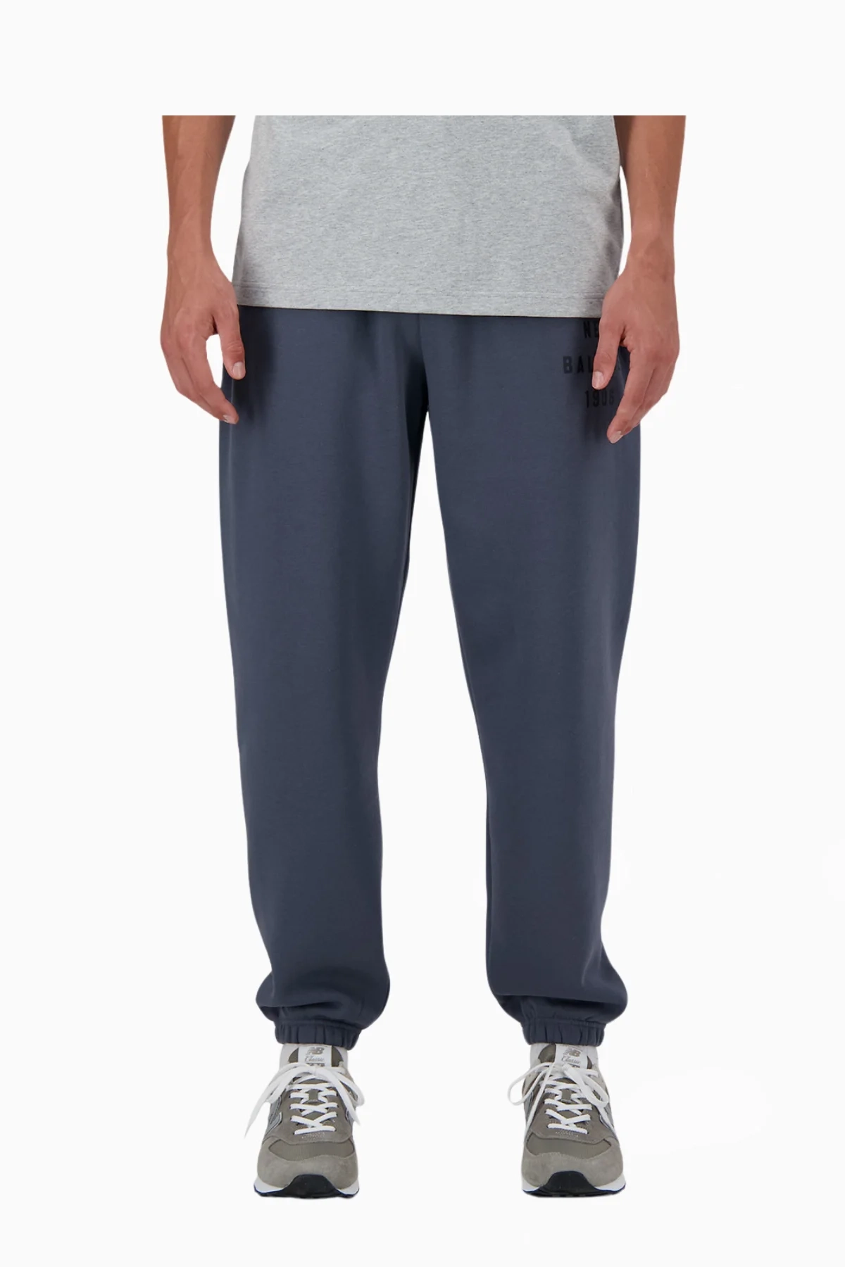 Spodnie New Balance Iconic Collegiate Fleece Jogger - Granatowy