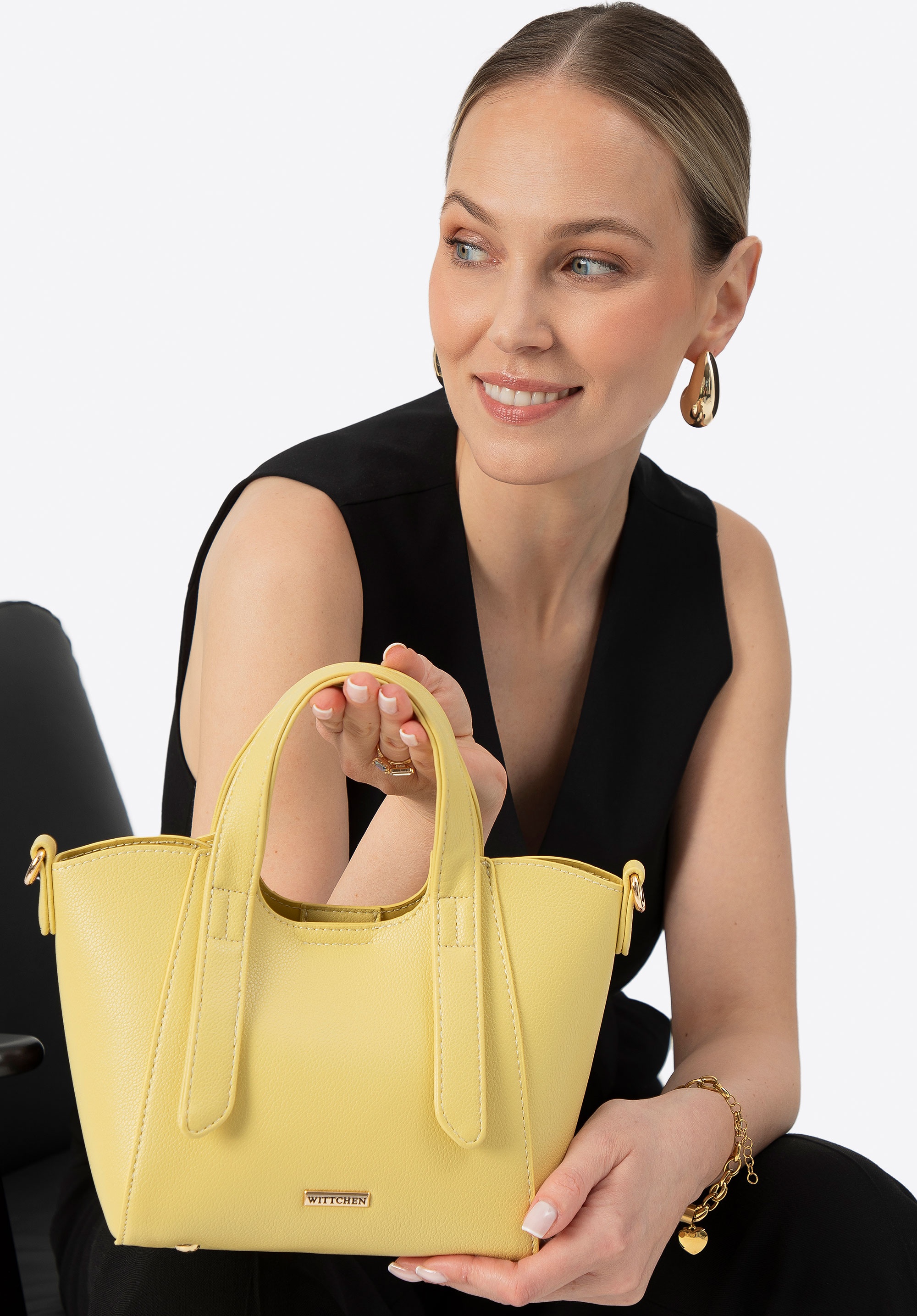 Damski kuferek z wyjmowaną saszetką mini żółty