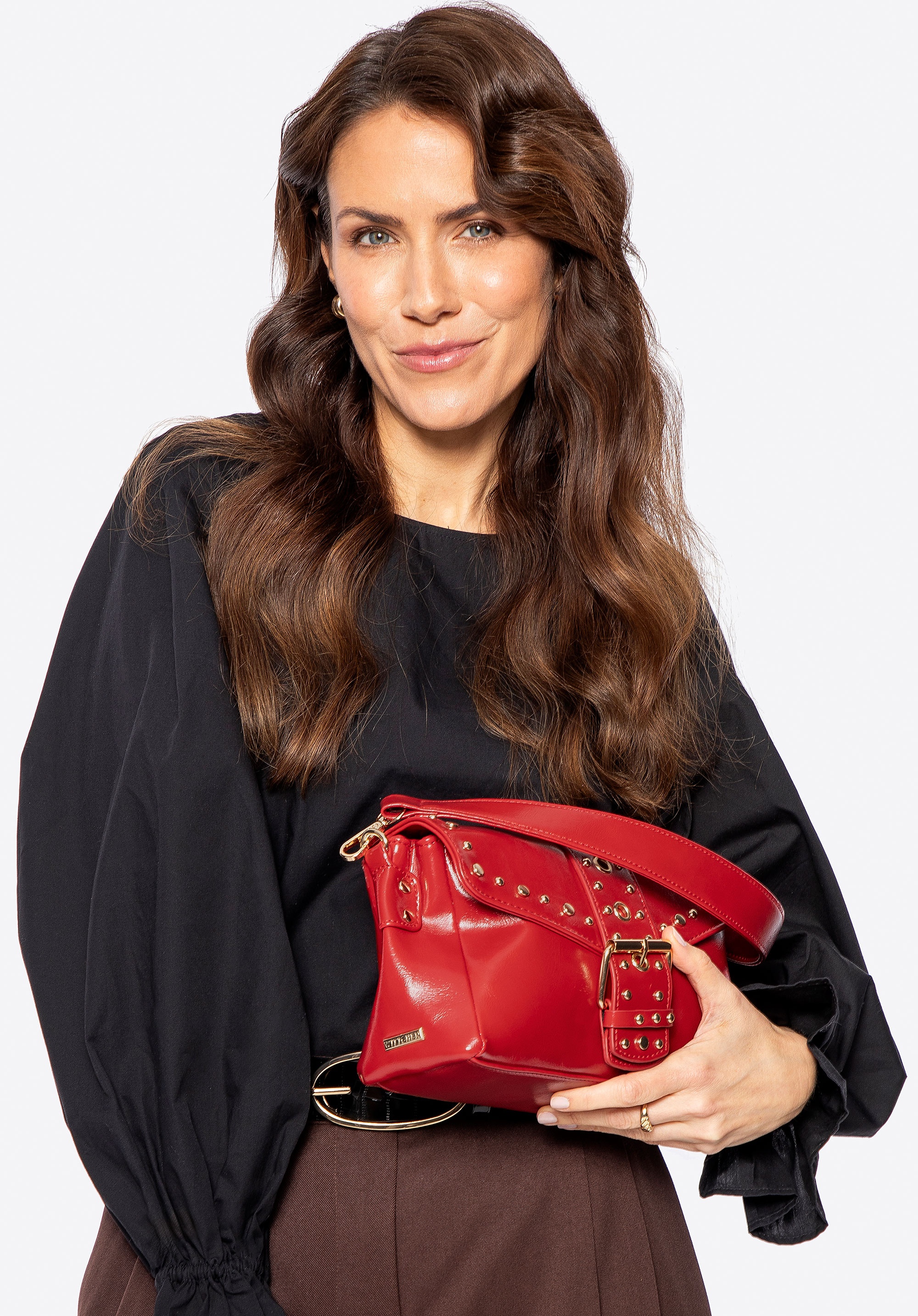 Damska crossbody z ekoskóry w dekoracyjne nity czerwona