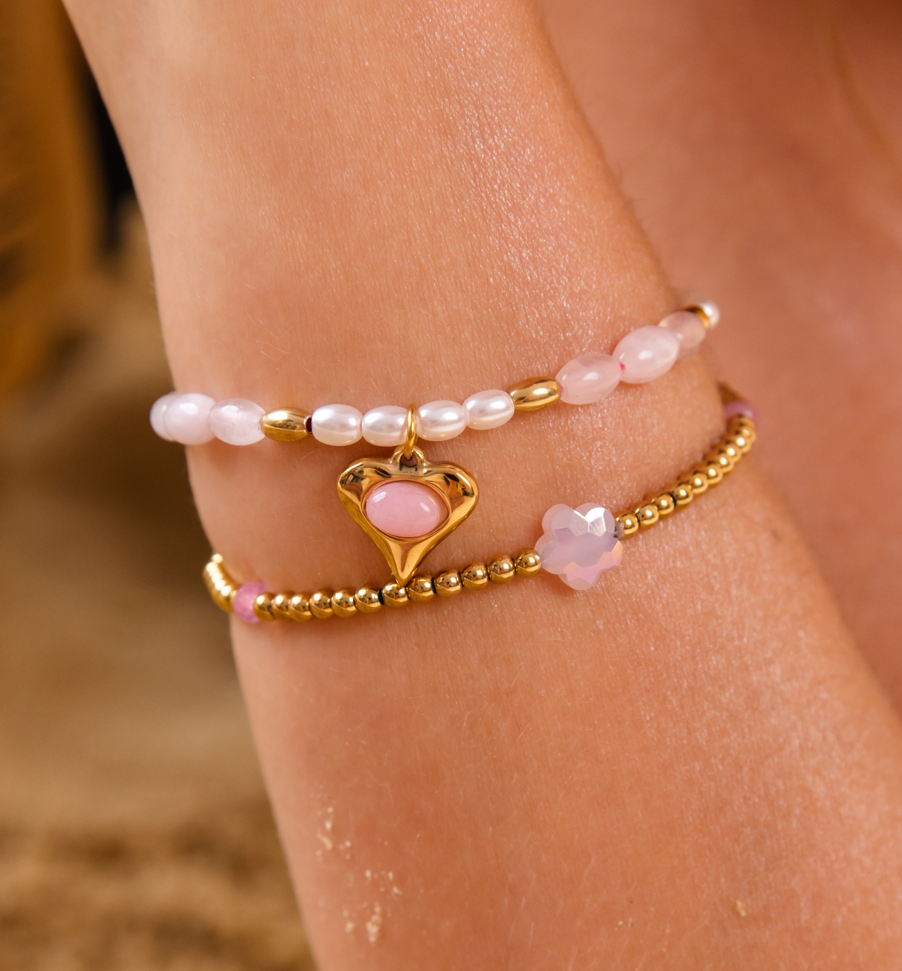 Bransoletka z różowymi kamieniami i sercem BSC2285