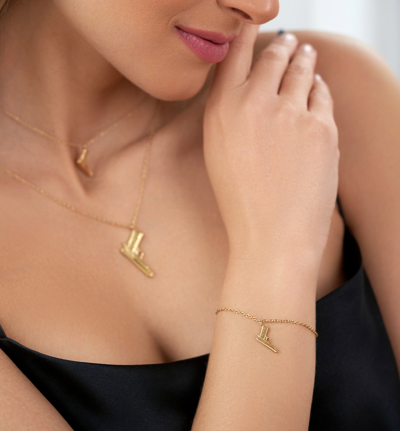 Bransoletka złota z pistoletem Gold Gun BSA0408