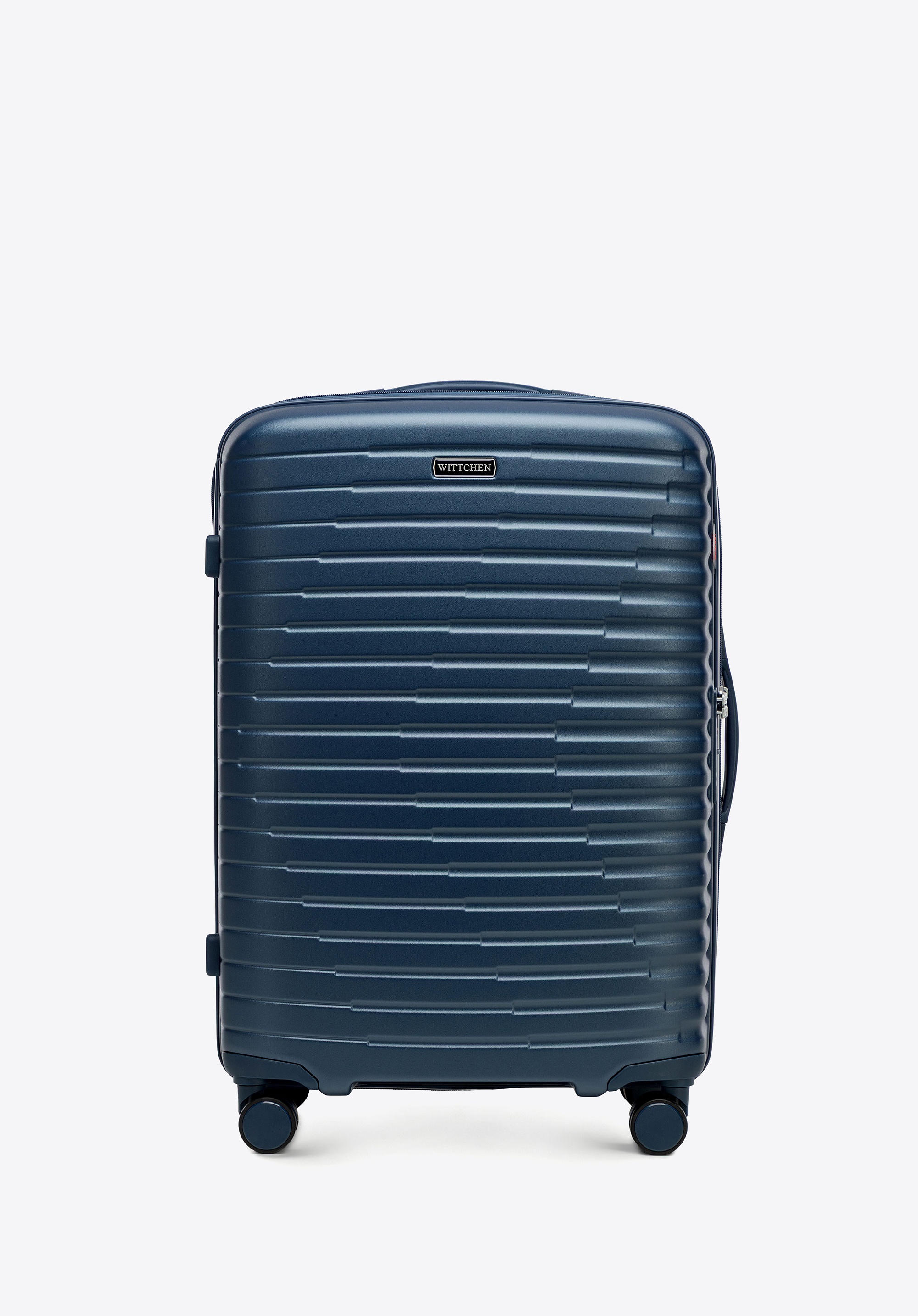 Średnia walizka z polikarbonu w poziome żebrowanie granatowa