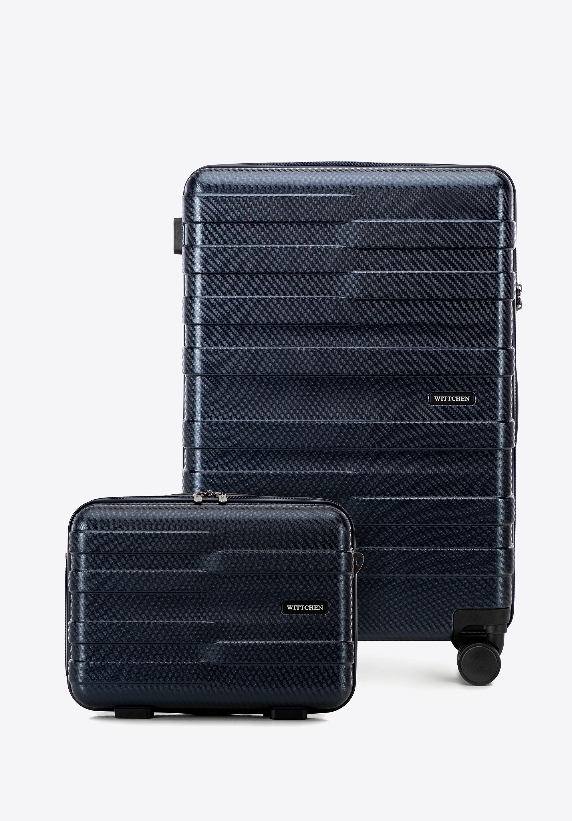 Średnia walizka i kosmetyczka z polikarbonu w poziome pasy granatowe