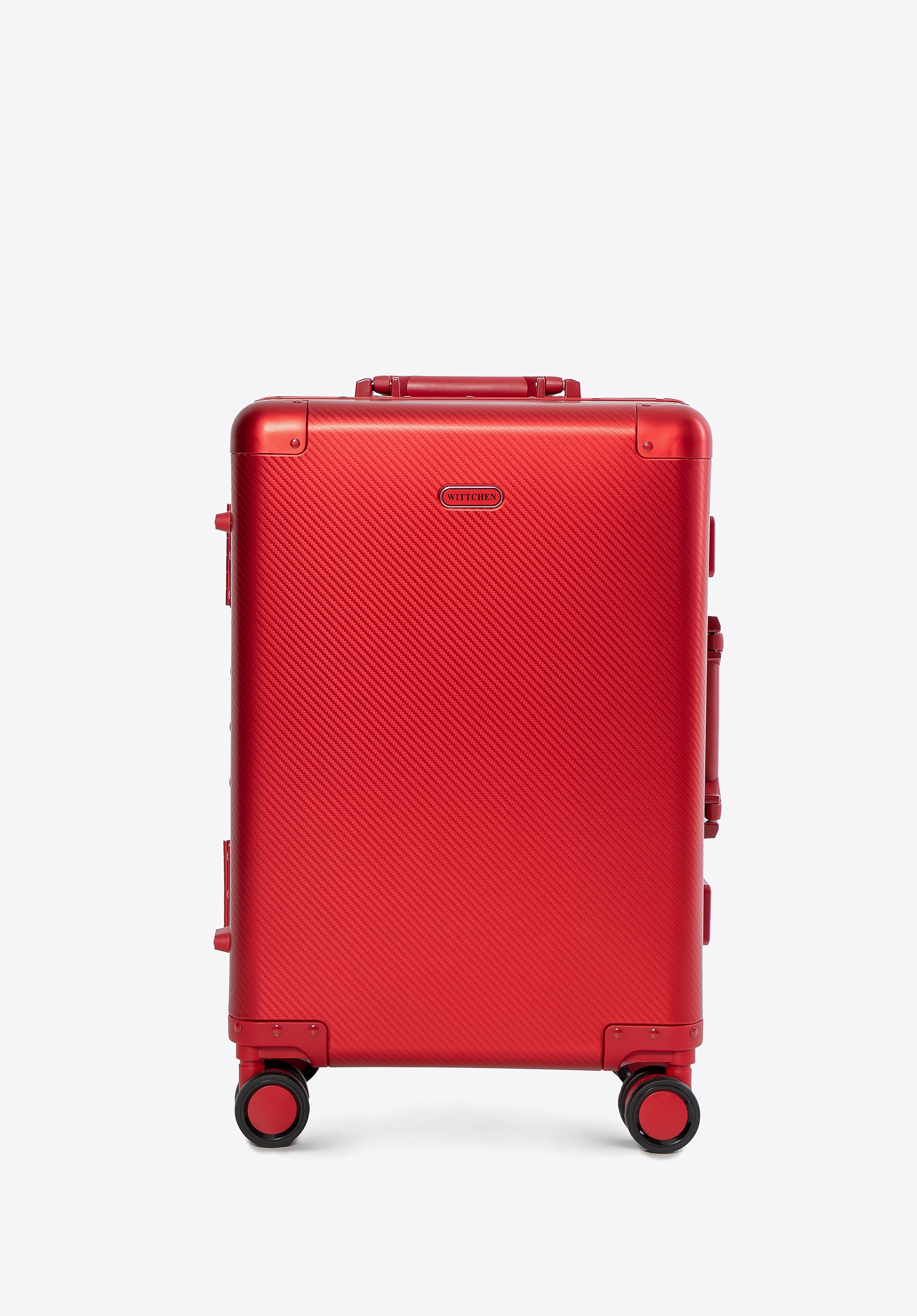 Mała walizka z aluminium na kółkach czerwona