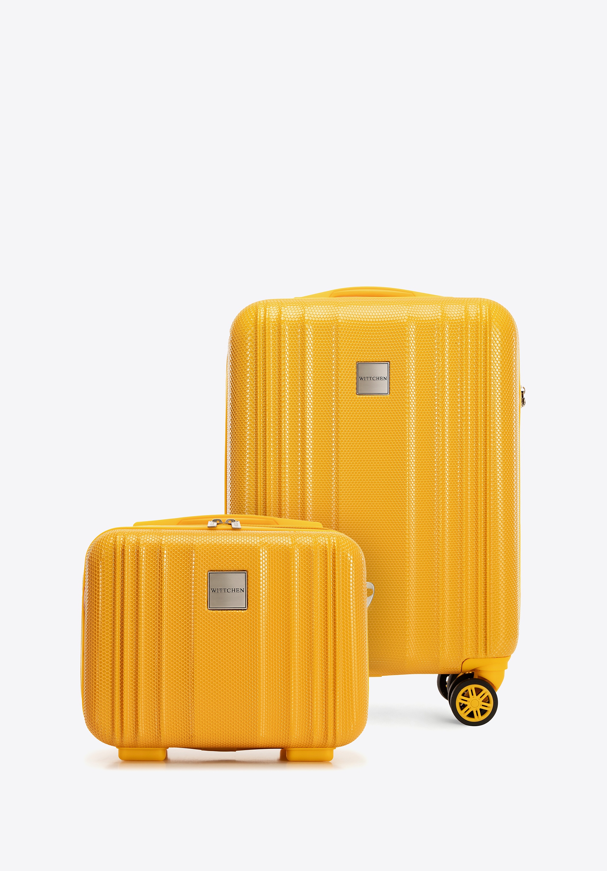 Mała walizka i kosmetyczka z polikarbonu tłoczone żółte