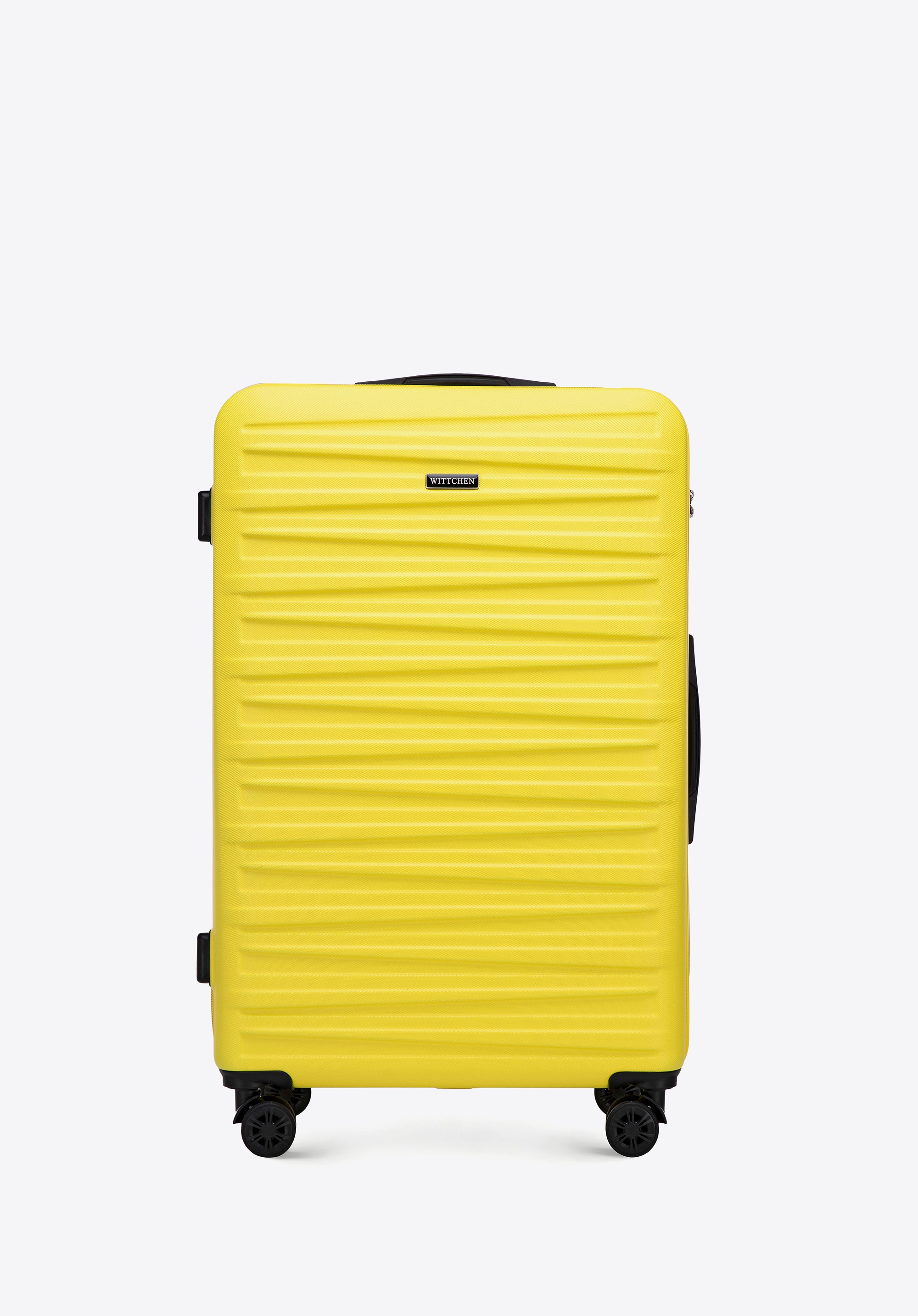 Duża walizka z ABS-u w poziome tłoczenie żółta