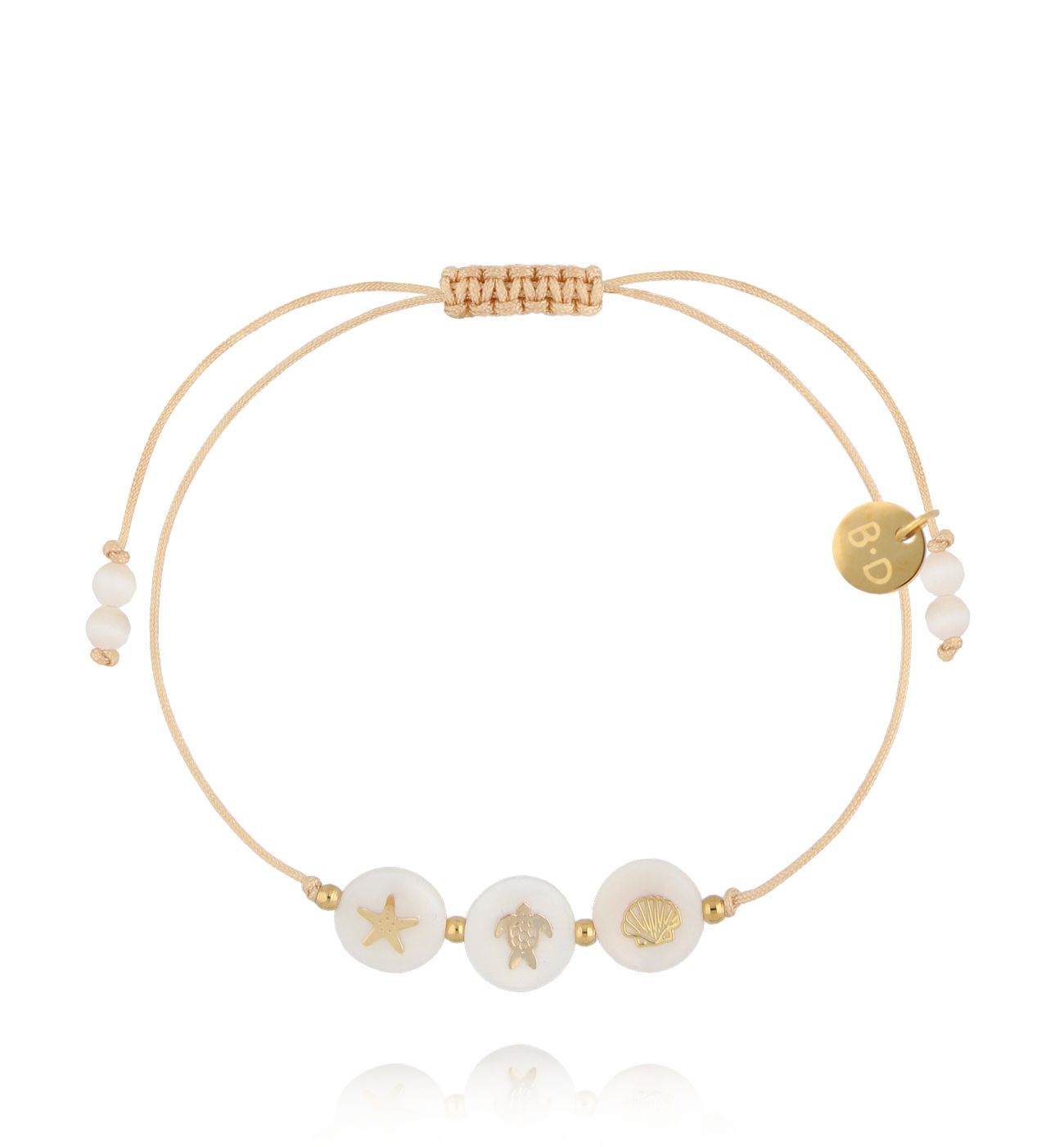 Bransoletka z beżowym sznurkiem i trzema elementami z symbolem morza BMT0342 - By Dziubeka