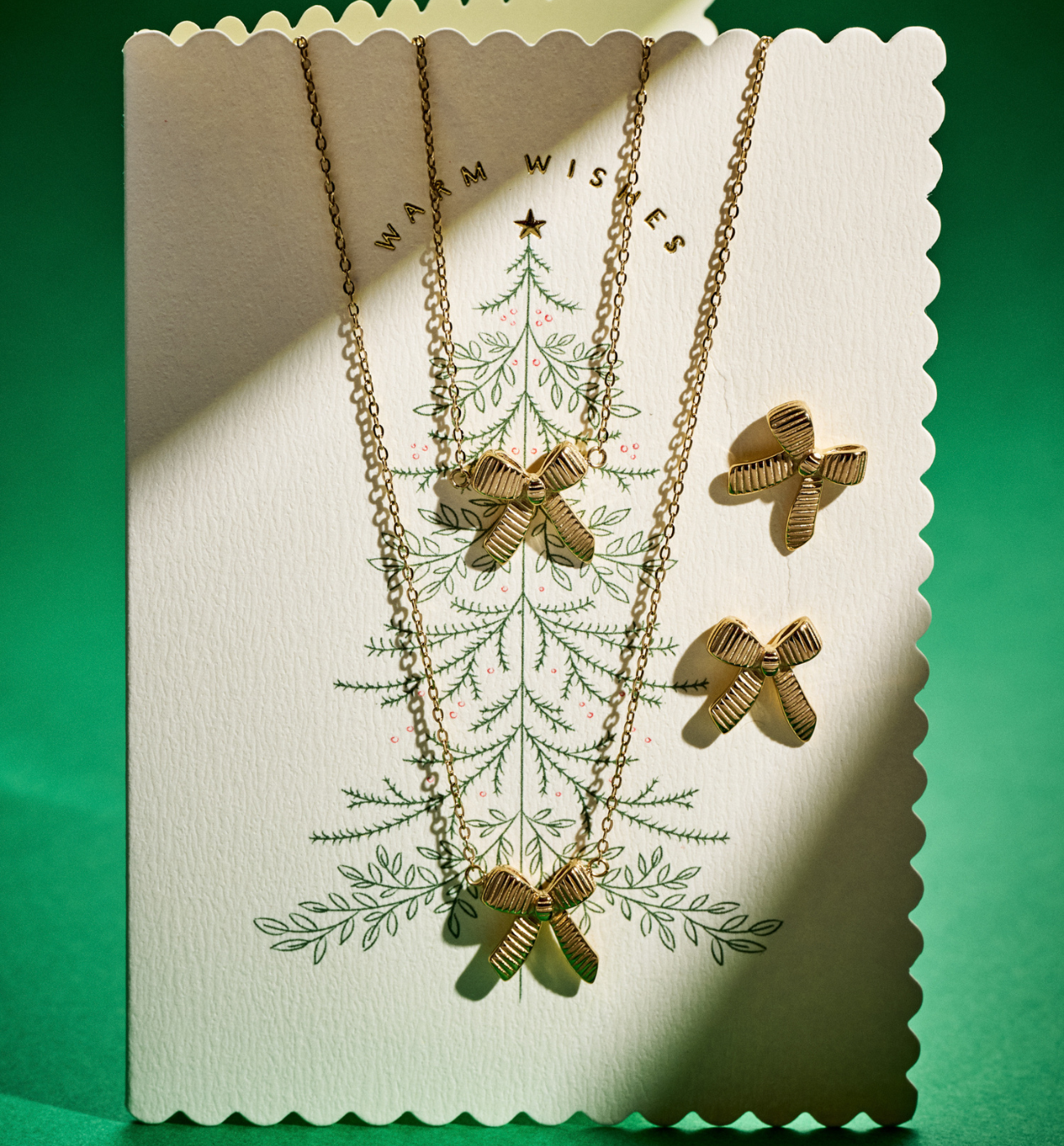 Zestaw świątecznej biżuterii ze złotymi kokardami ZN0063 - By Dziubeka