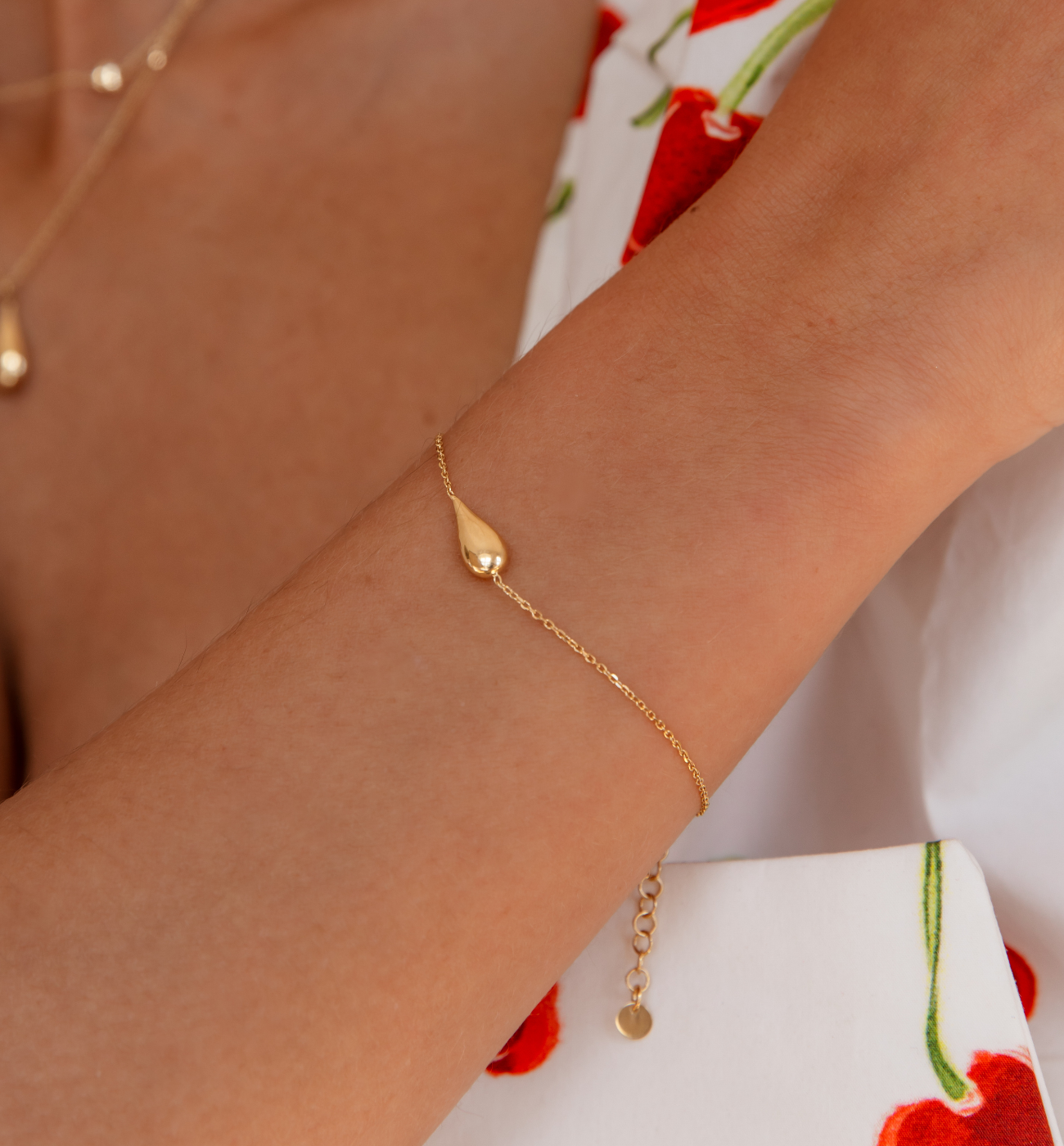 Bransoletka z kroplą złota BGG0020