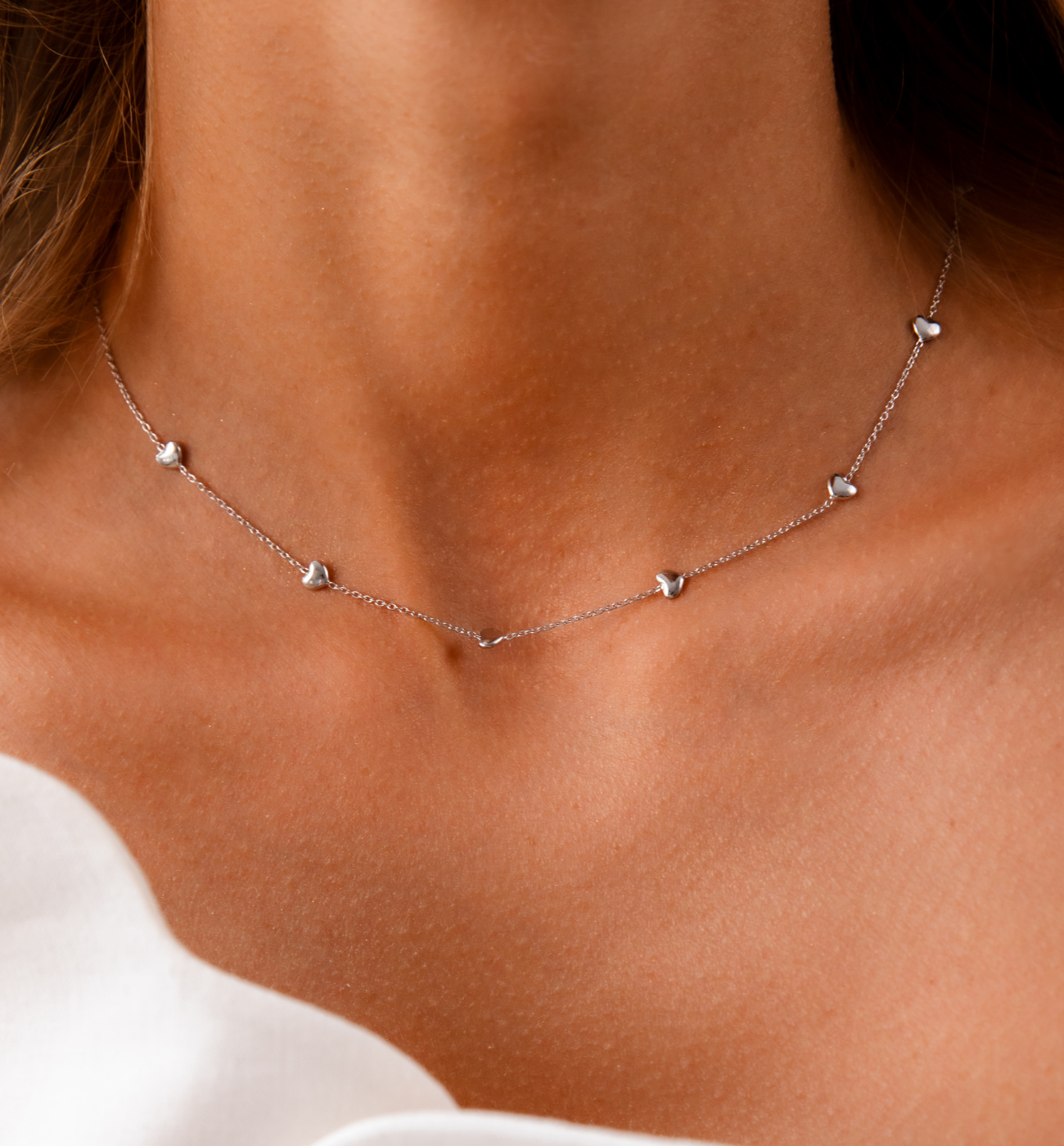 Naszyjnik z serduszkami srebrny NGG0009