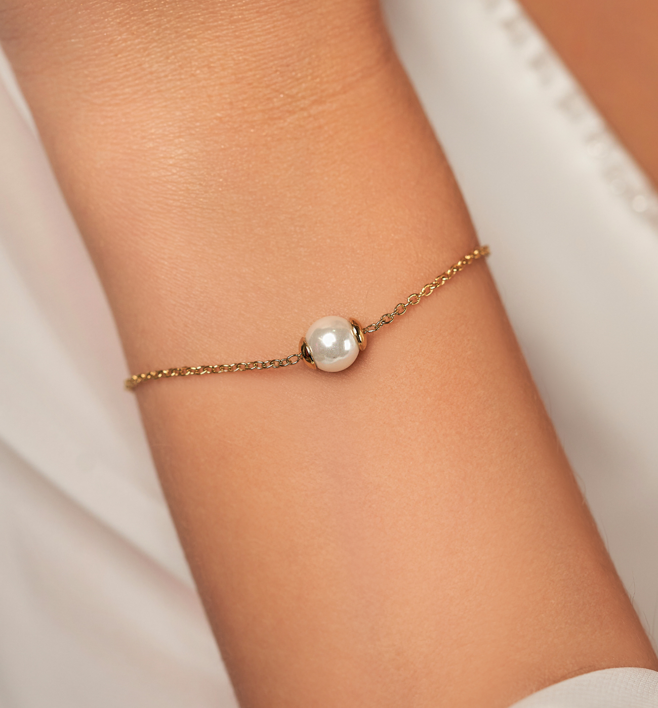 Bransoletka ze stali szlachetnej z perłą pozłacana Independent BSA0187