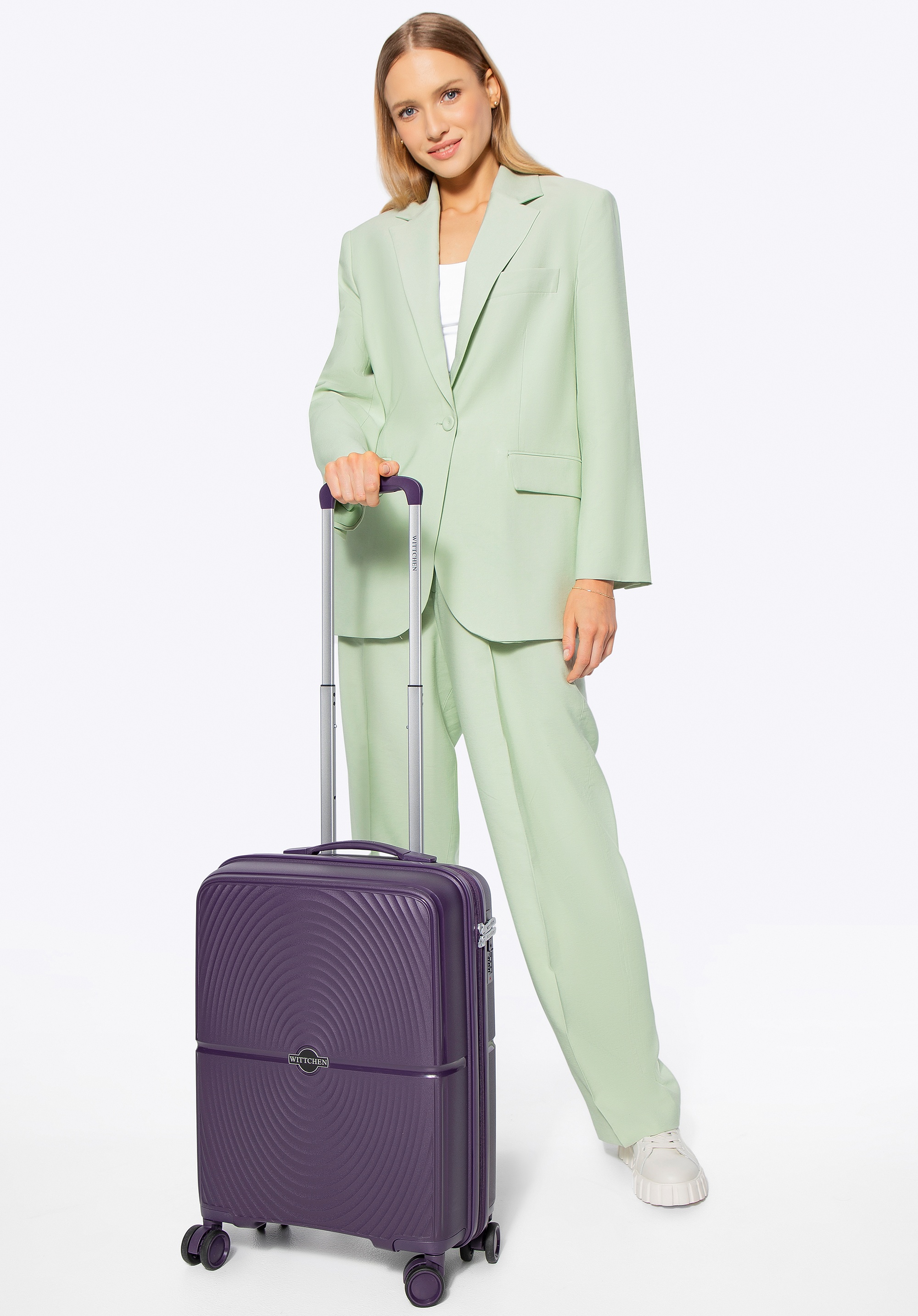 Mała walizka z polipropylenu w okręgi fioletowa