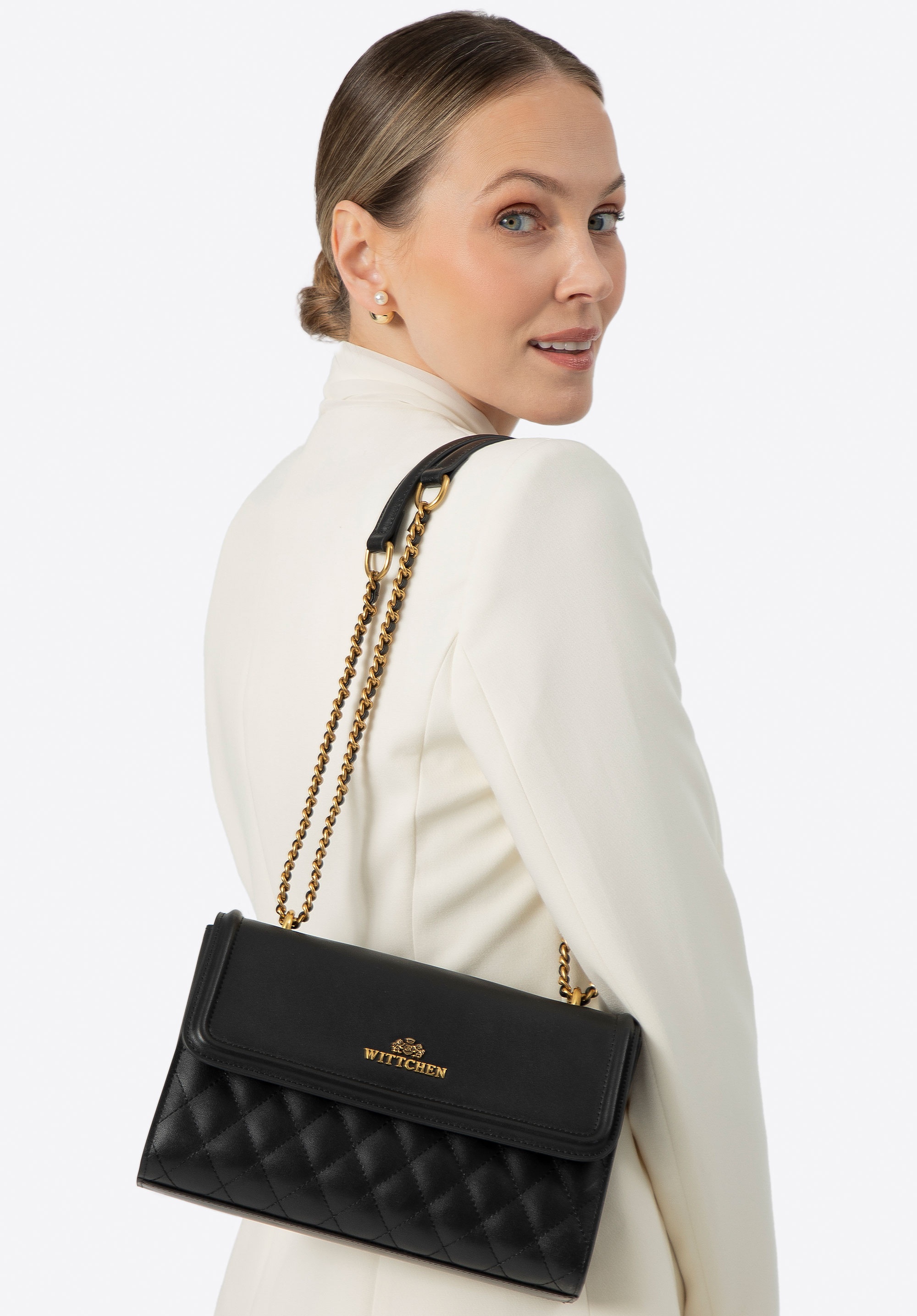 Damska listonoszka ze skóry naturalnej w pikowanie czarno - złota