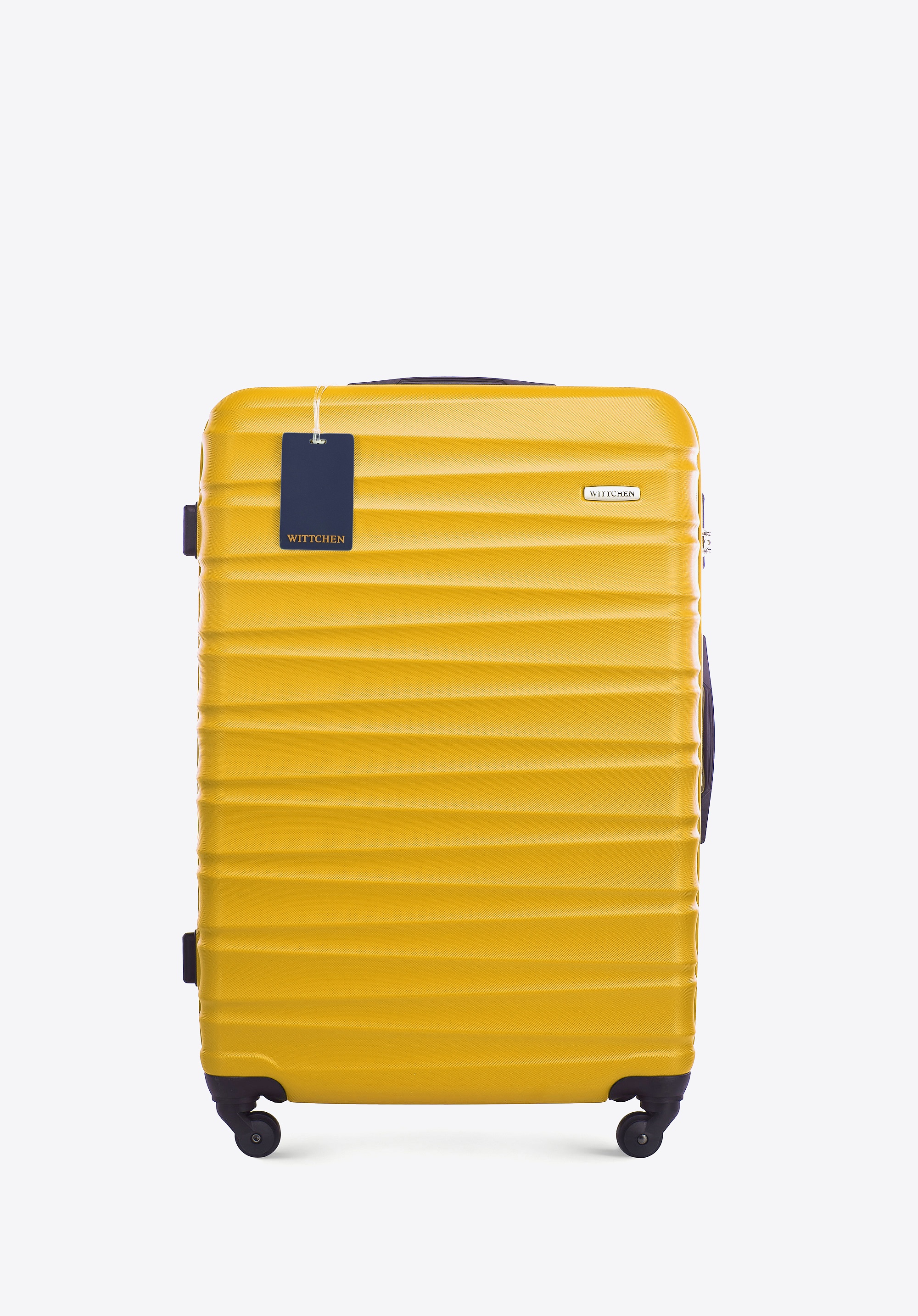 Duża walizka z ABS-u i identyfikator z logo WITTCHEN żółta