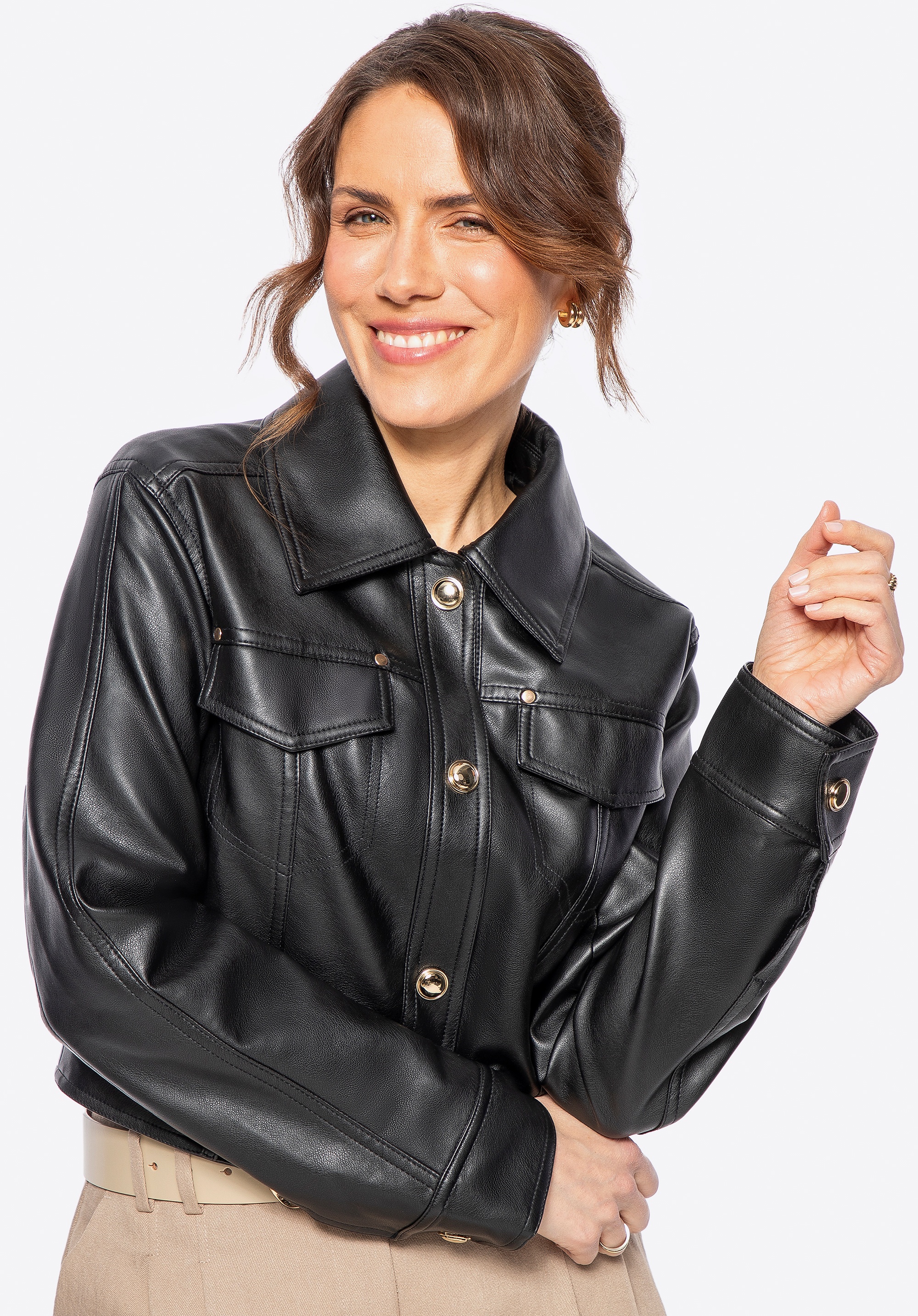 Damska kurtka ze skóry ekologicznej z patkami czarna