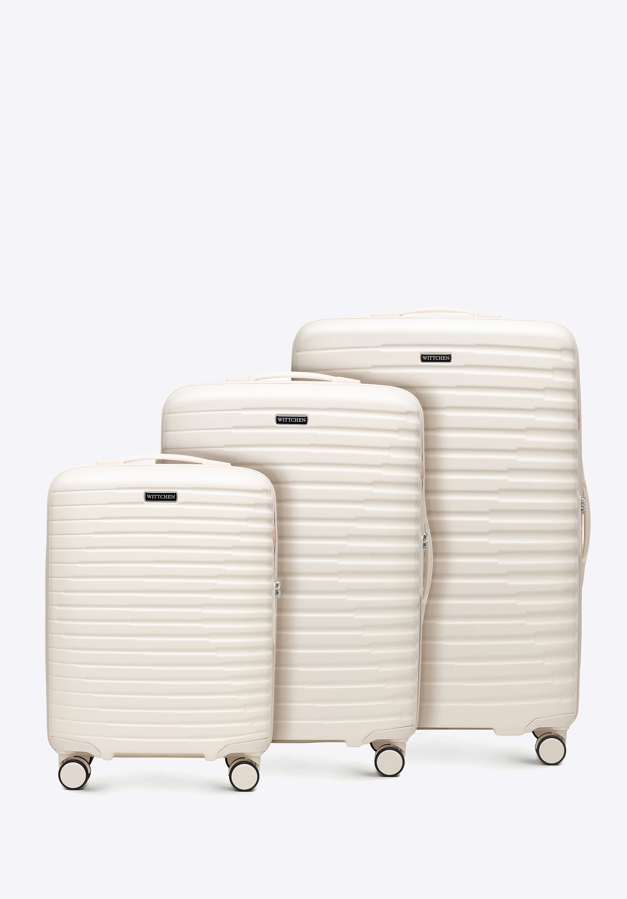 Zestaw walizek z polikarbonu w poziome żebrowanie kremowy