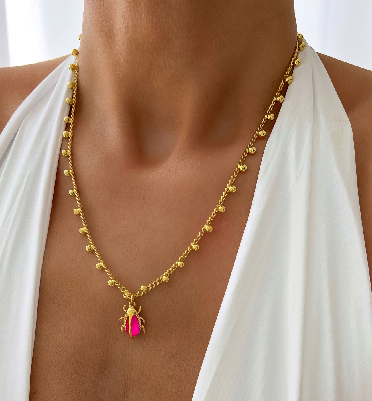 Naszyjnik złoty z fuksjowym żukiem Siyo - By Dziubeka