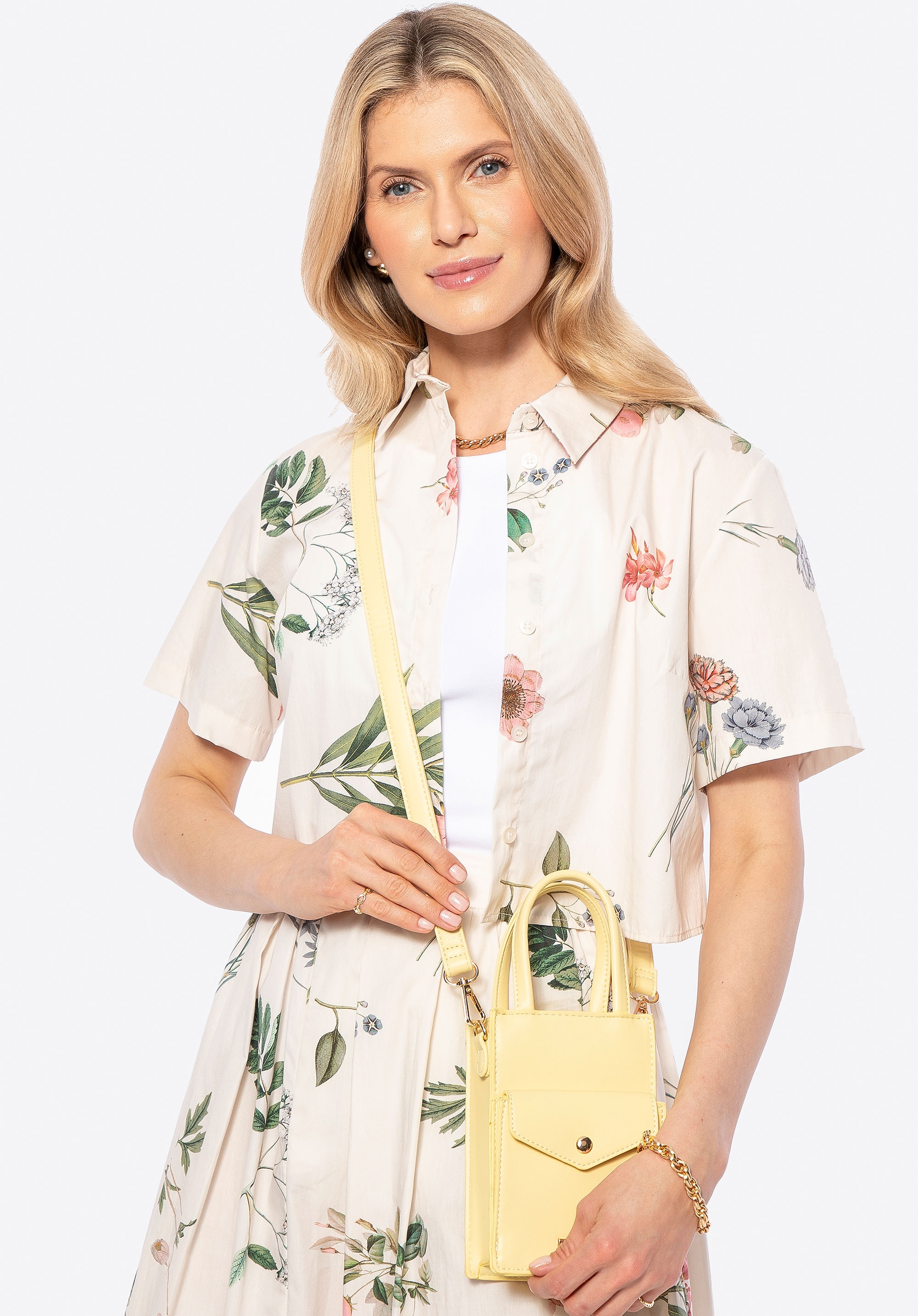 Damska minitorebka na telefon z ekoskóry żółta