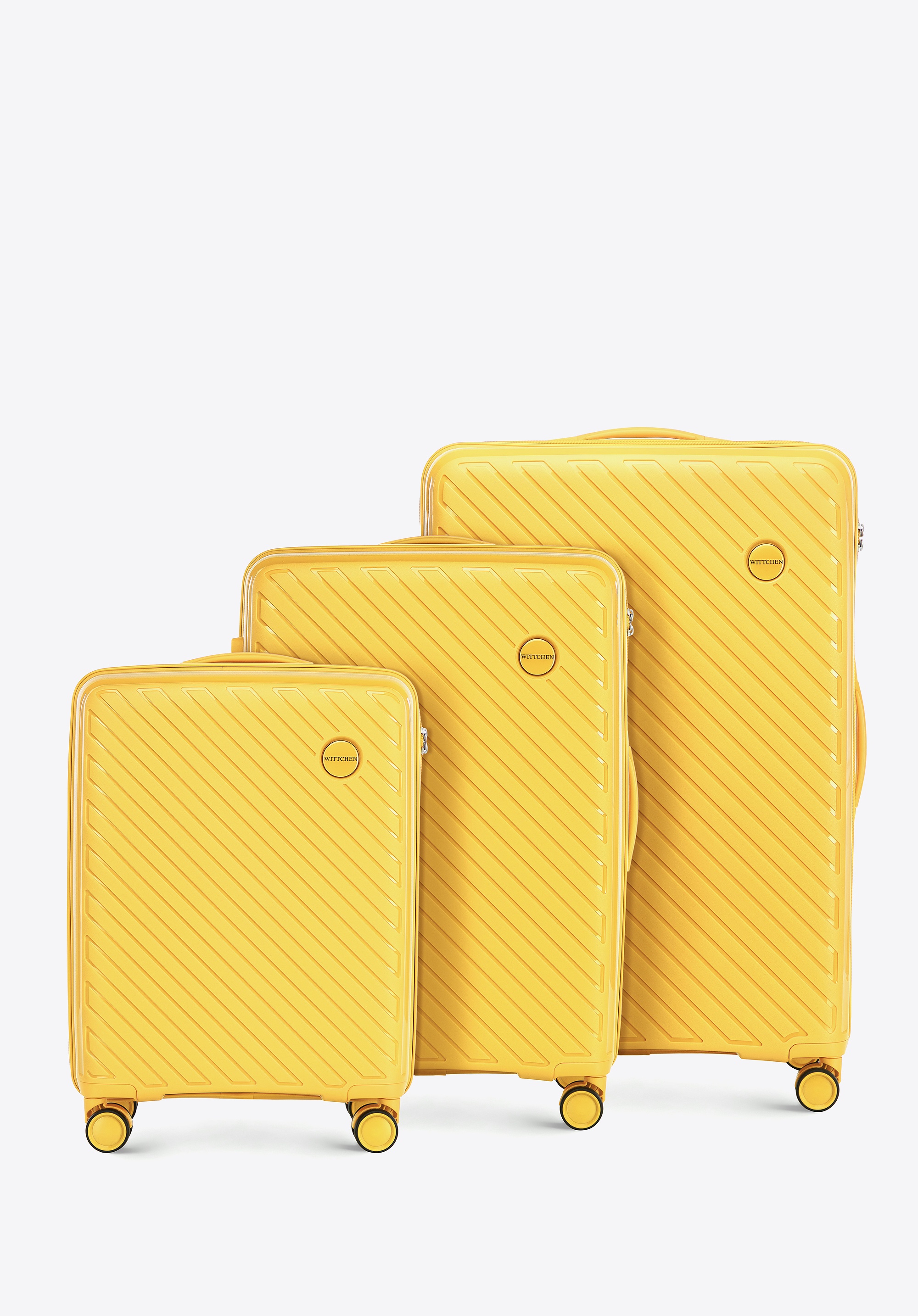 Zestaw walizek z polipropylenu w tłoczone paski żółty