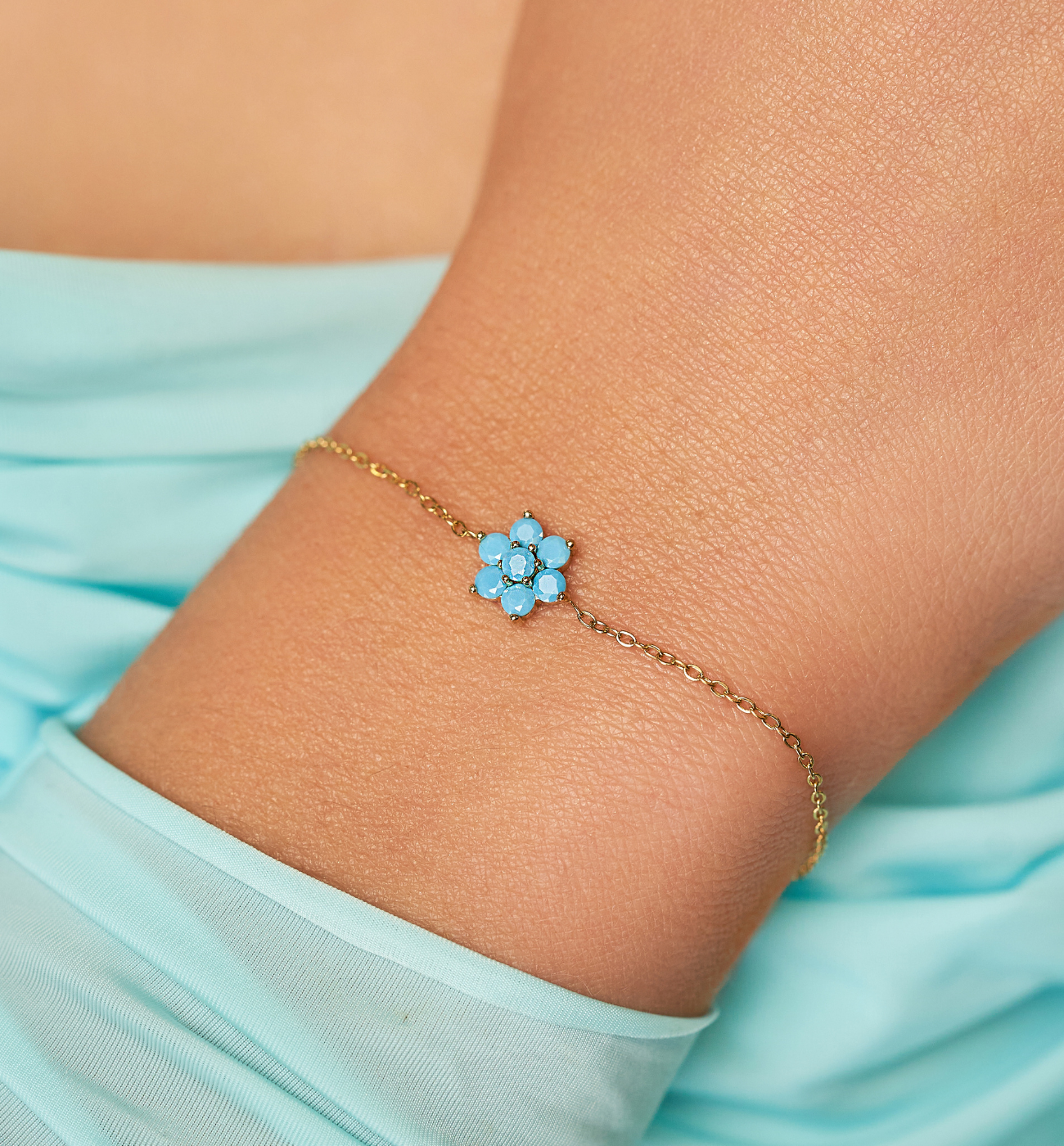 Bransoletka złota z kwiatuszkiem z turkusowymi cyrkoniami Azure BSA0561