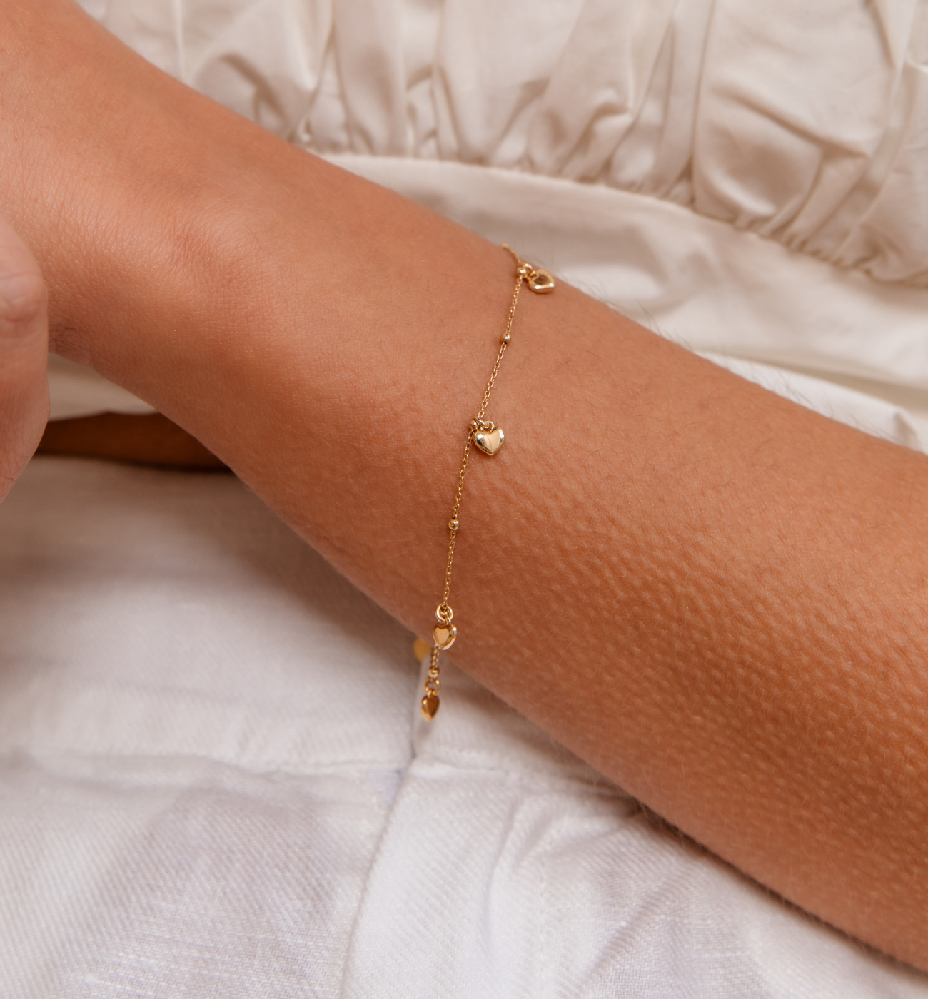 Bransoletka z sercami złota BGG0008