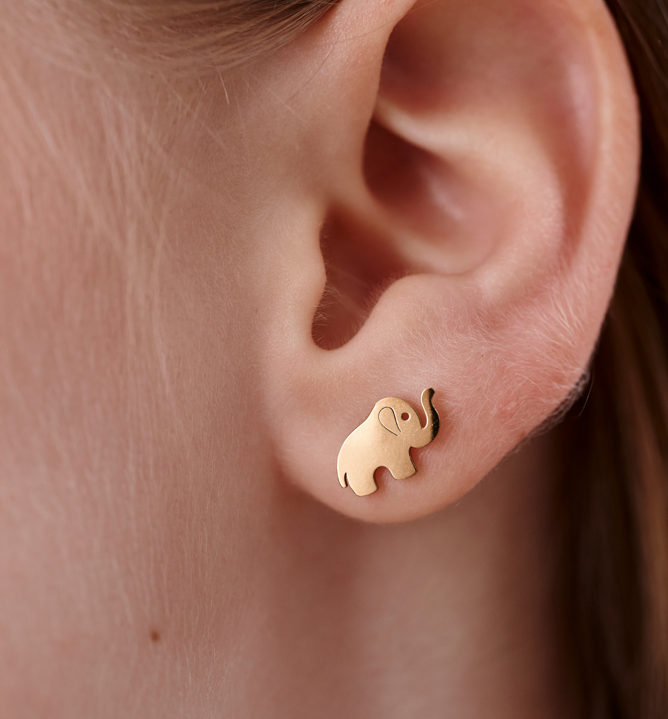 Kolczyki wkrętki w kształcie słonika złote KSY0624