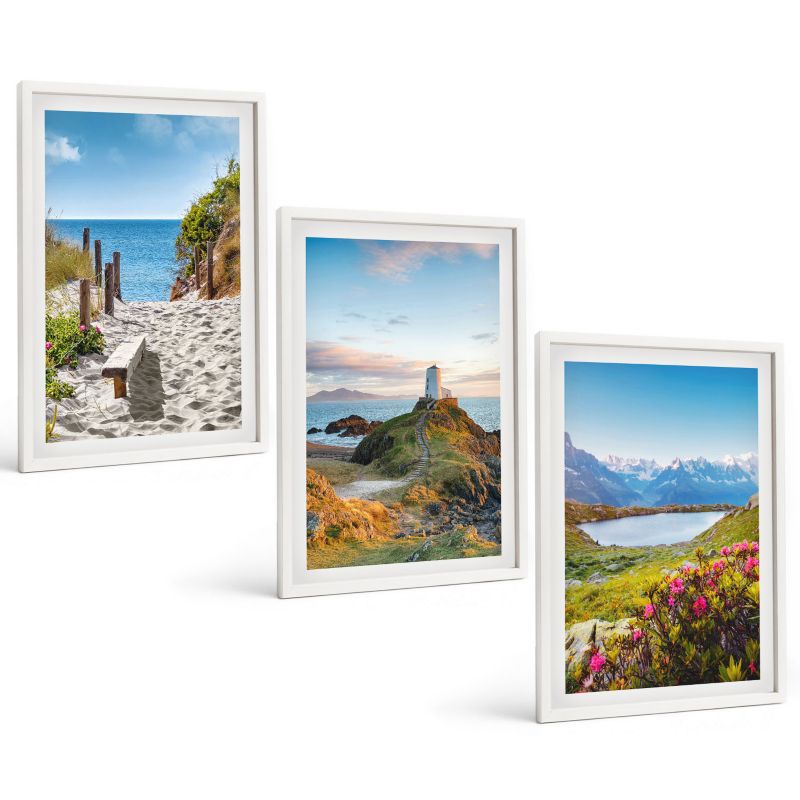 Galeria 3 Obrazów w Białej Ramie ArtPrintCave 40x60 cm Komplet ścienny Plaża latarnia góry kwiaty 1 kpl.