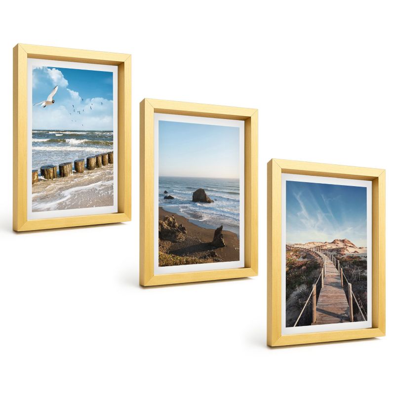 Galeria 3 Obrazów w Złotej Ramie ArtPrintCave 20x30 cm Komplet ścienny Plaża fale niebo molo spacer 1 kpl.