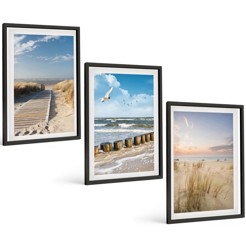 Zestaw 3 Obrazów w Czarnej Ramie ArtPrintCave 40x60 cm Galeria Ścienna Plaża piasek fale niebo ptaki 1 kpl.