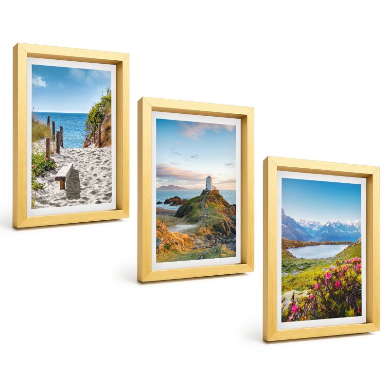 Galeria 3 Obrazów w Złotej Ramie ArtPrintCave 20x30 cm Komplet ścienny Plaża latarnia góry kwiaty 1 kpl.