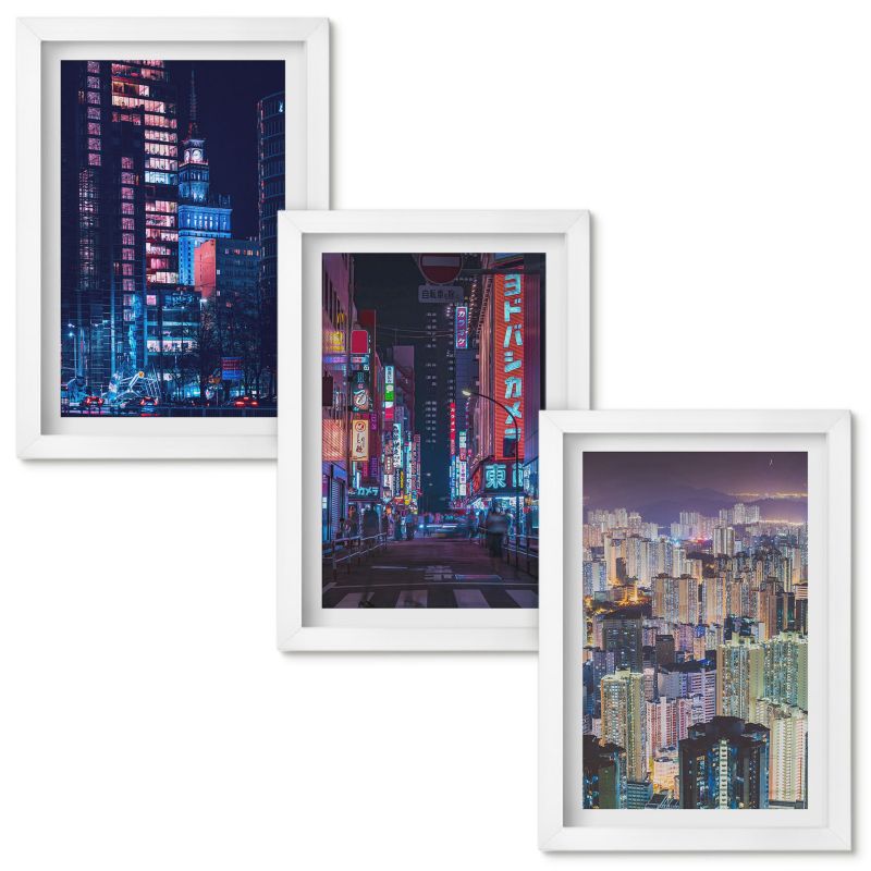 Obrazy Do Sypialni Wallfluent Nocne miasto neonowe światła Biała rama 20x30cm 3 szt.