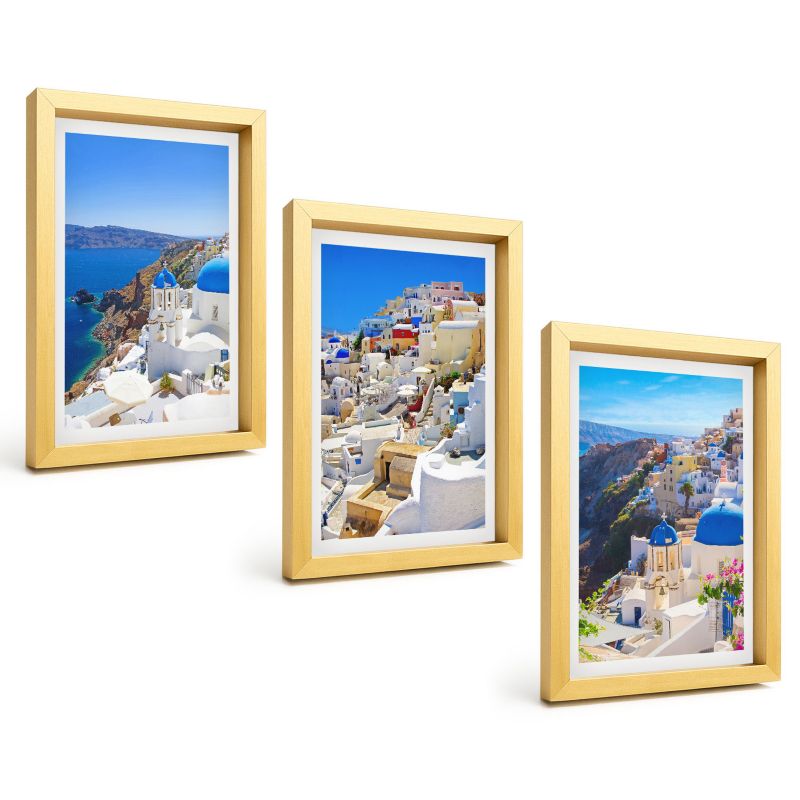 Trzyczęściowy Zestaw Obrazów ArtPrintCave 20x30 cm Złota rama Krajobraz architektura Oia Santorini 1 kpl.