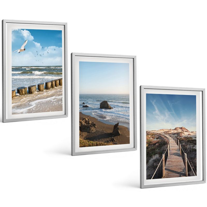 Galeria 3 Obrazów w Srebrnej Ramie ArtPrintCave 40x60 cm Komplet ścienny Plaża fale niebo molo spacer 1 kpl.