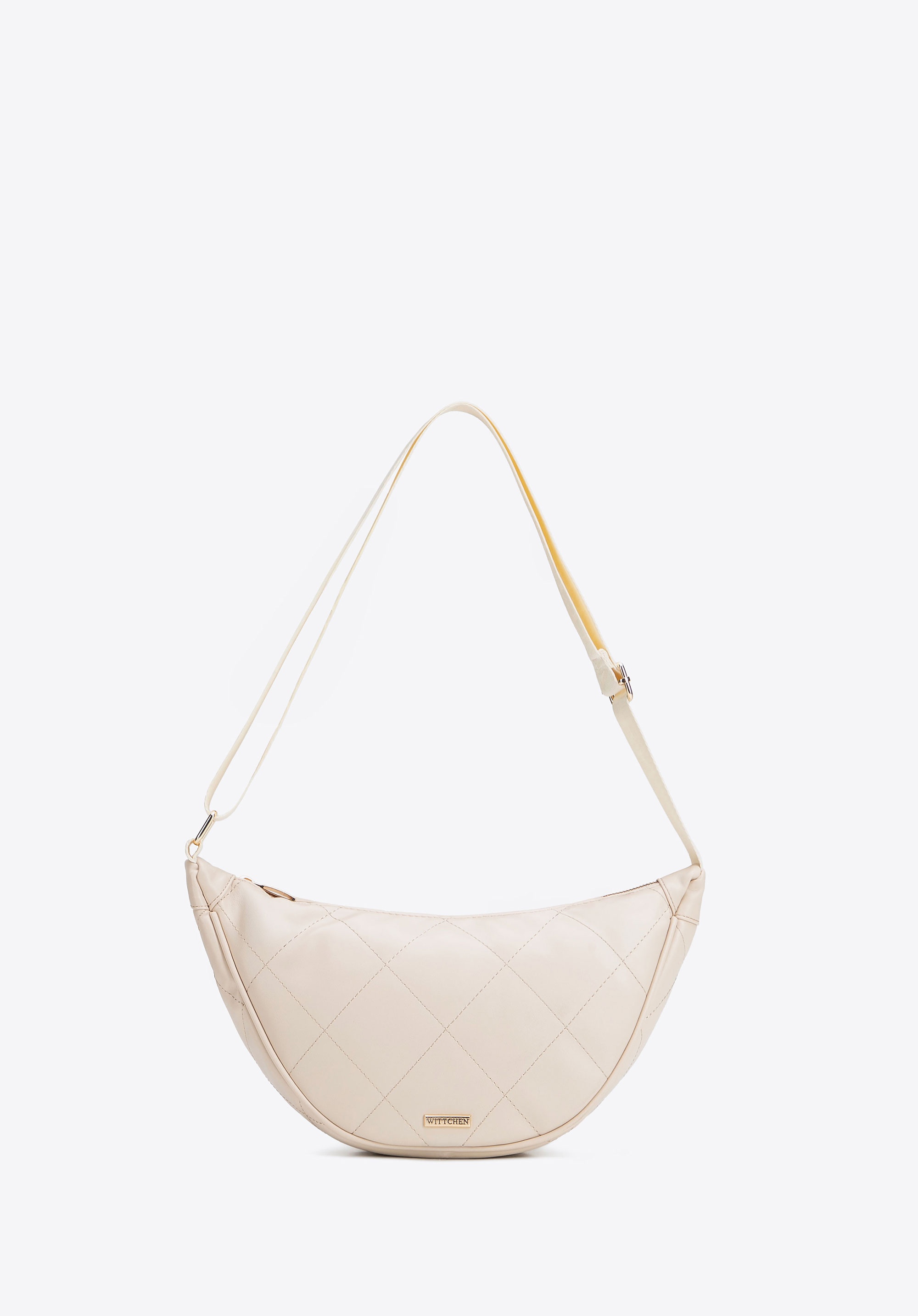 Damska torebka crossbody w geometryczne przeszycia kremowo - złota