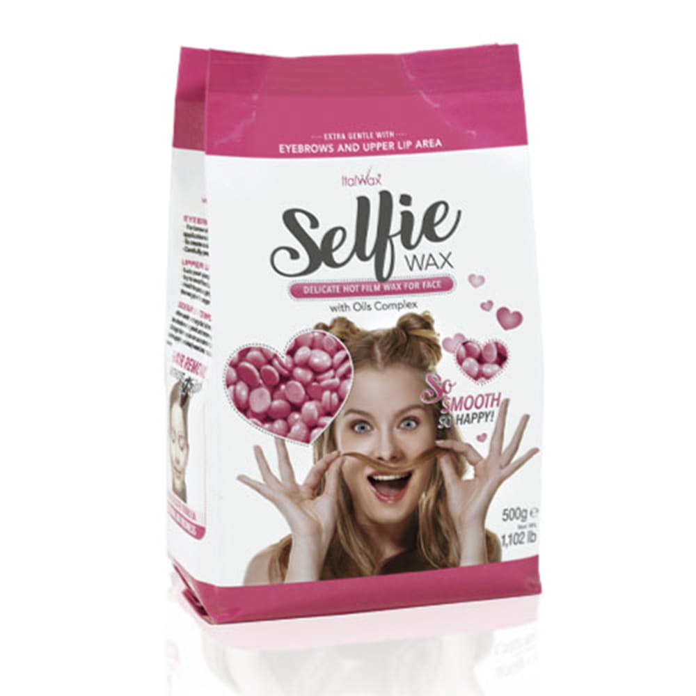 Delikatny wosk niskotemperaturowy do depilacji twarzy z kompleksem olejków w dropsach Italwax Selfie Wax 500 g